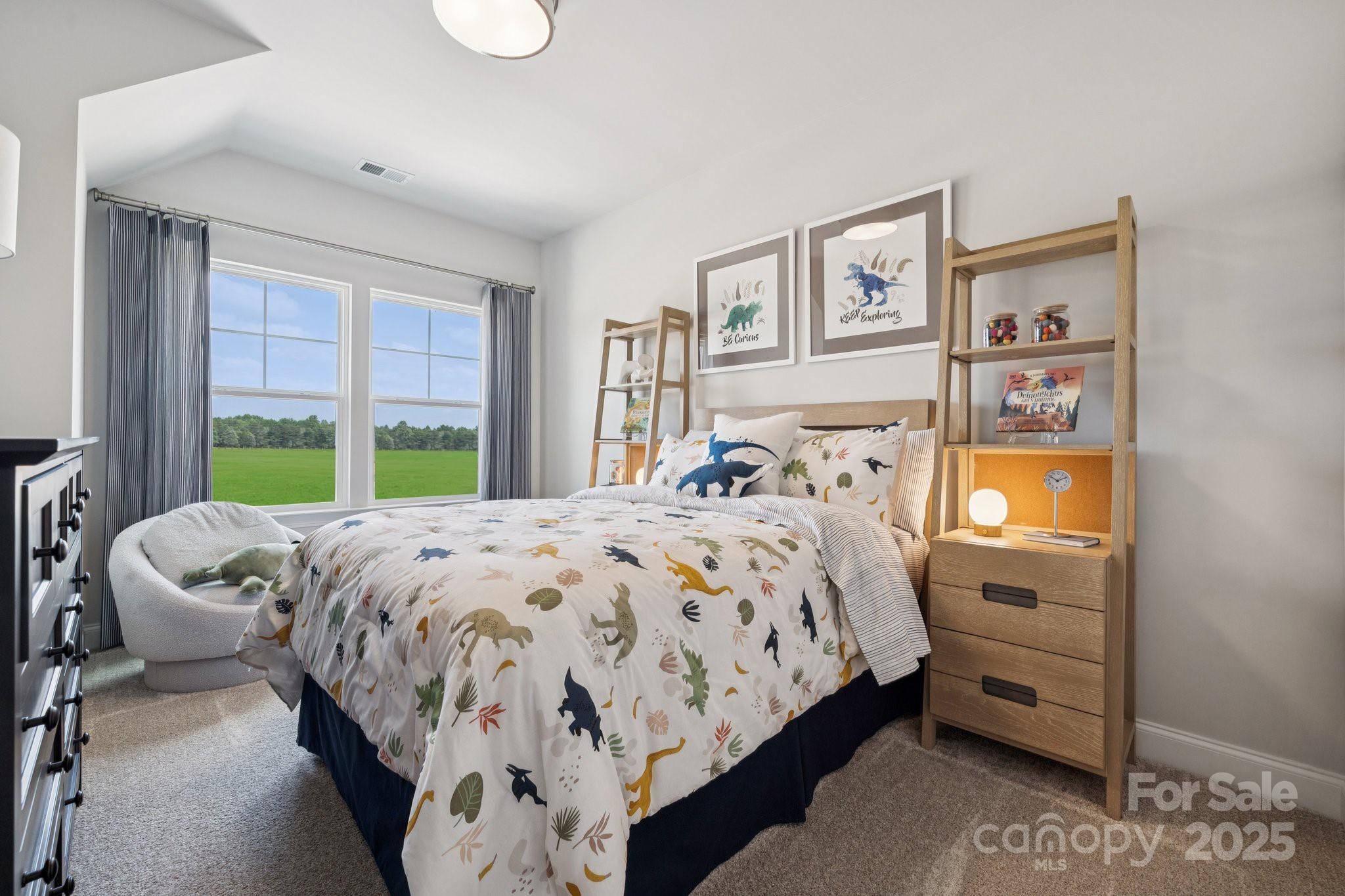1285 Margo Mannor None Fort Mill Fort Mill, SC 29708 - Photo 14 of 33 a bedroom with a bed and a window