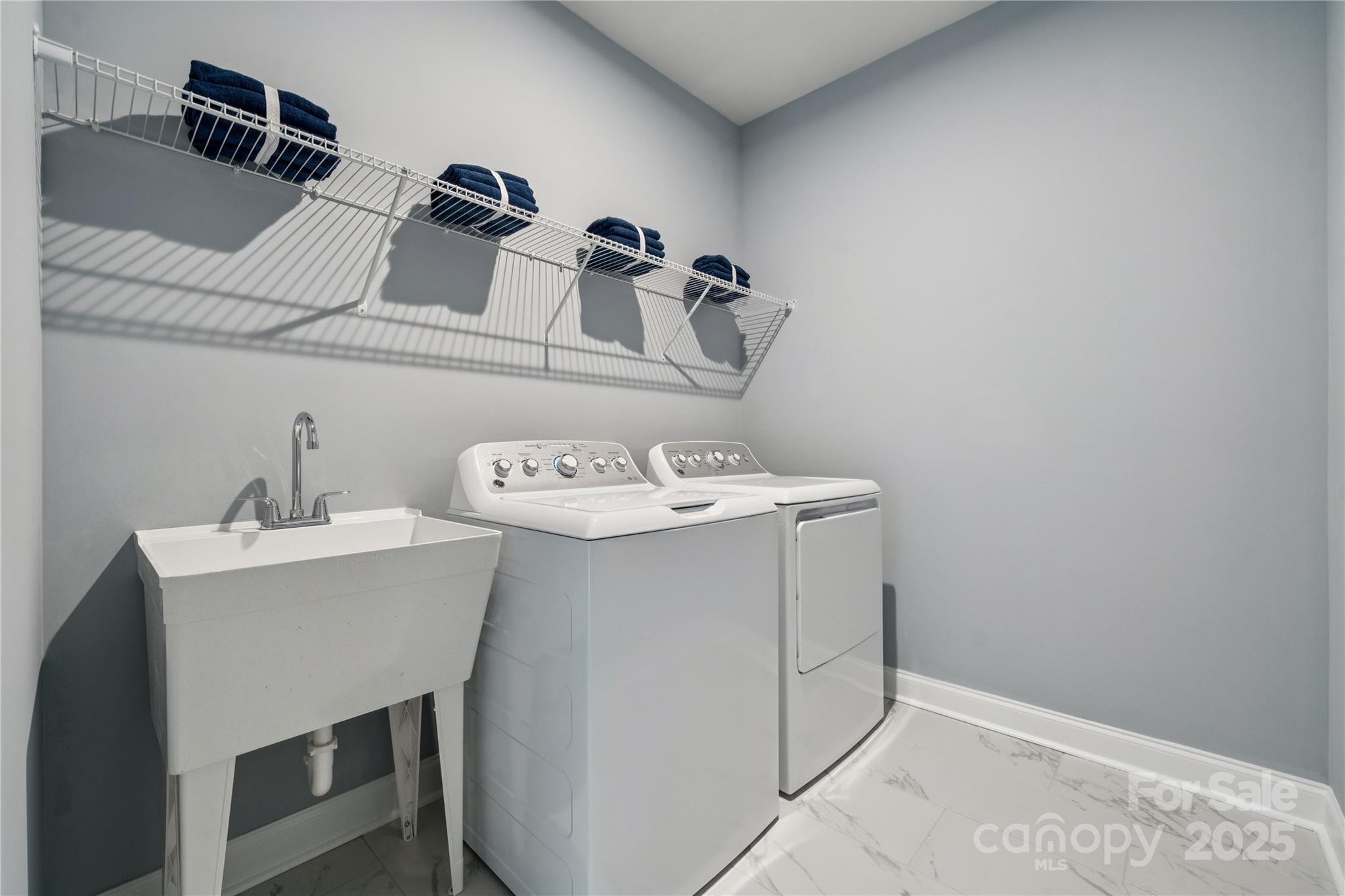 1285 Margo Mannor None Fort Mill Fort Mill, SC 29708 - Photo 17 of 33 a utility room with dryer and washer