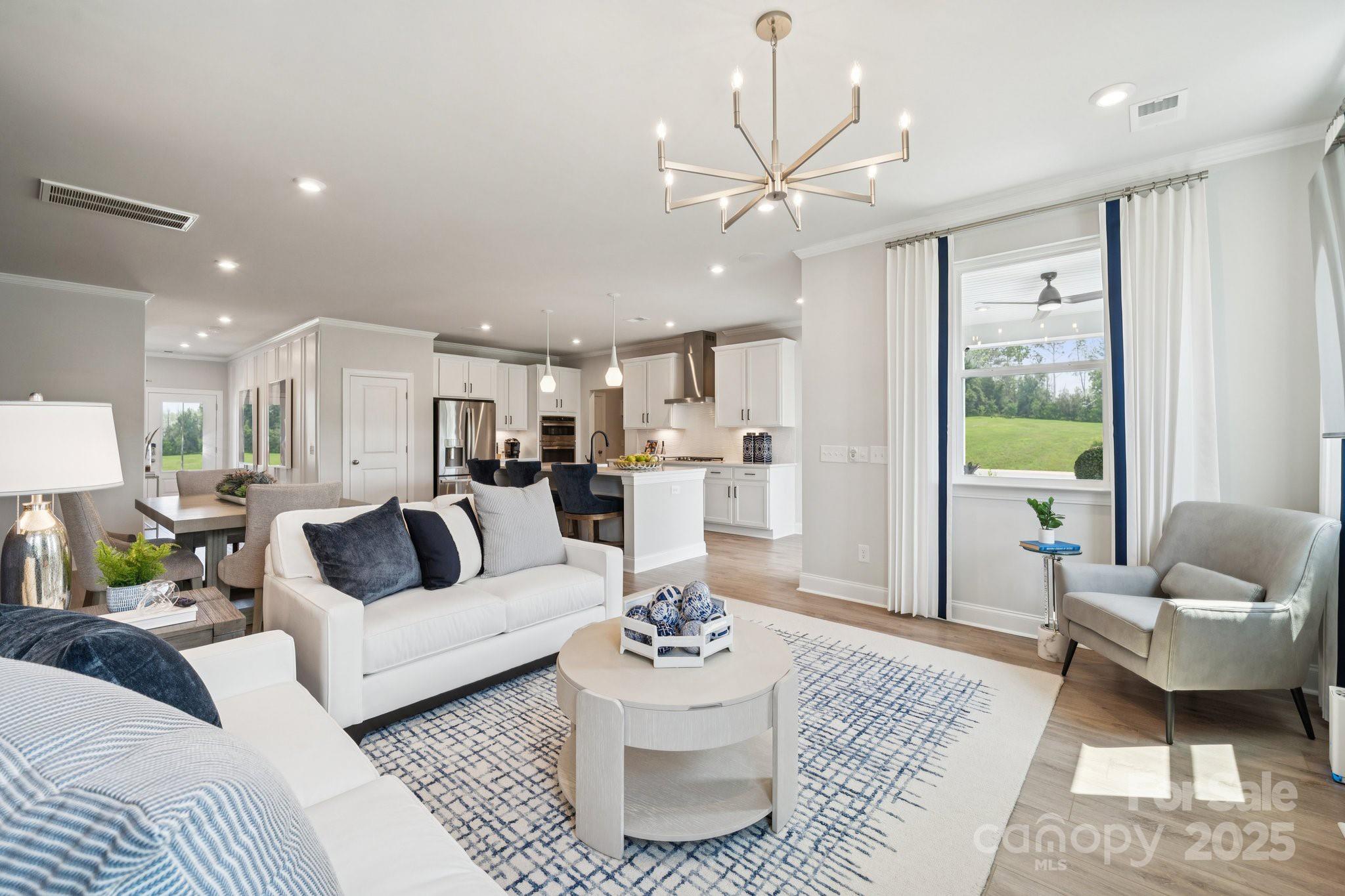 1285 Margo Mannor None Fort Mill Fort Mill, SC 29708 - Photo 22 of 33 a living room with furniture and a large window