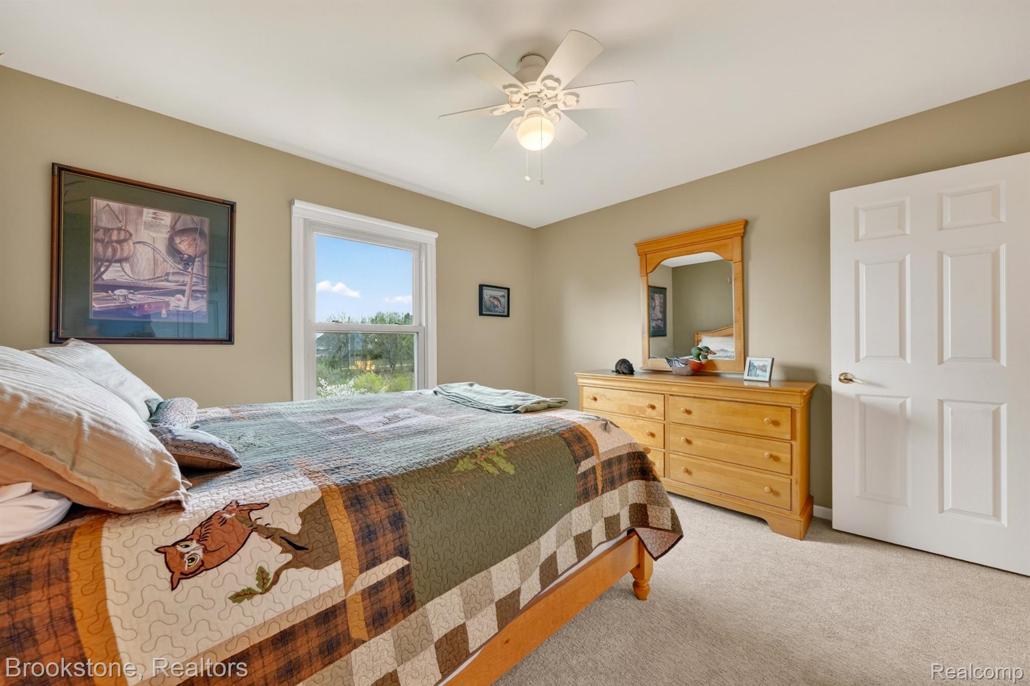 4054 Calumet Drive Rochester, MI 48306 - Photo 22 of 44 Bedroom featuring light carpet and a ceiling fan