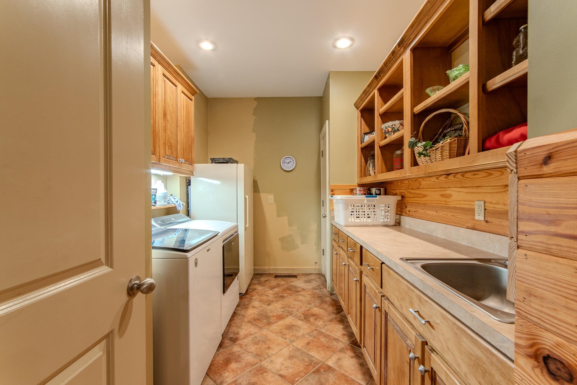 2690 Fellowship Road Sardis, TN 38371 - Photo 18 of 40 a kitchen with granite countertop a sink and a stove top oven