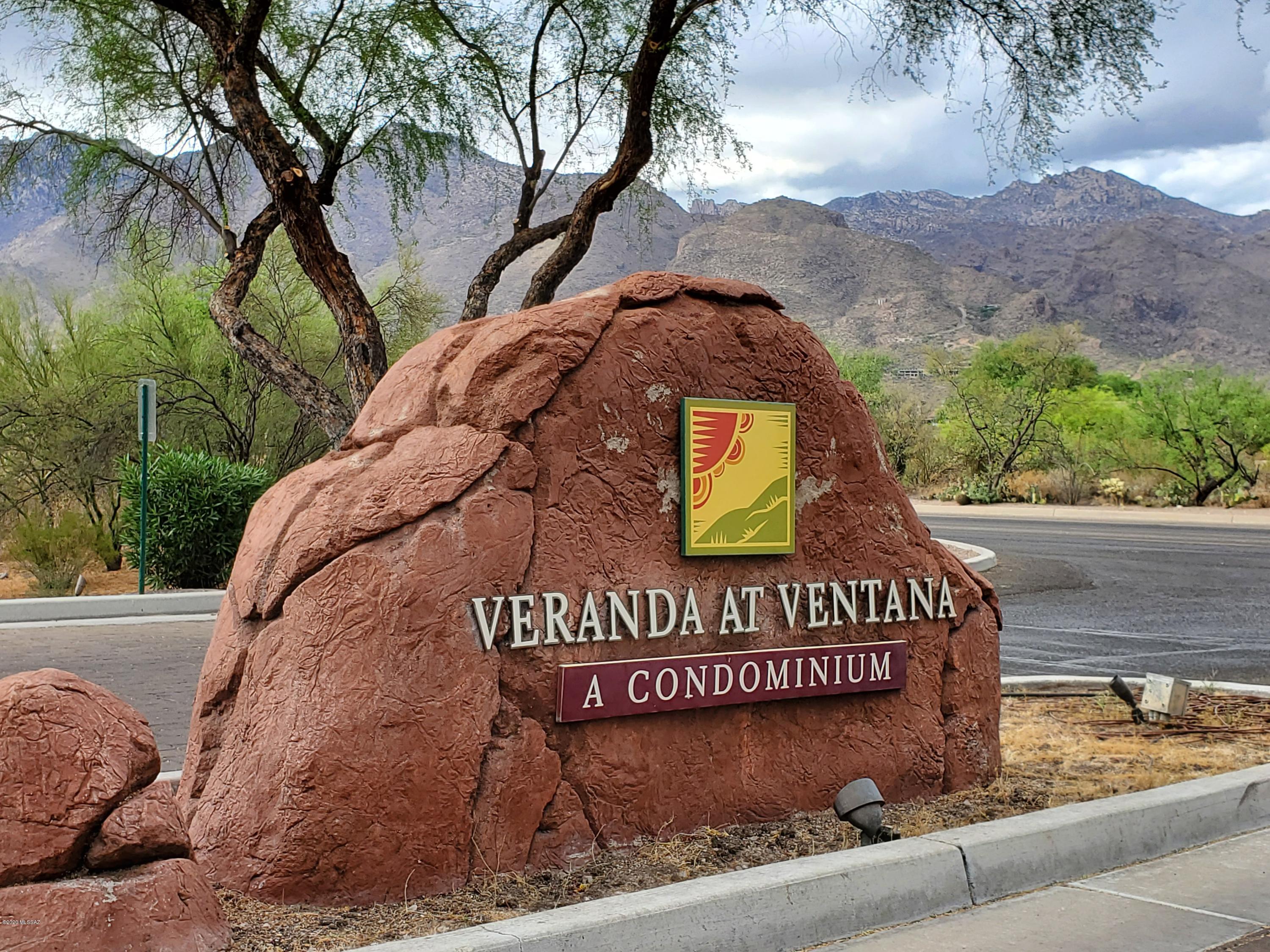 5751 North Kolb Road, Unit 36203 Tucson, AZ 85750 - Photo 1 of 25 a sign that is sitting on a brick wall