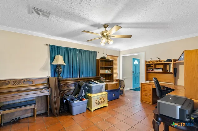a view of a dining room with furniture wooden floor and chandelier