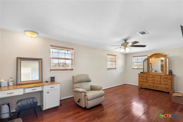 a bathroom with a toilet and a sink