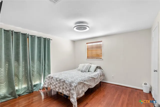 a bathroom with a sink and toilet