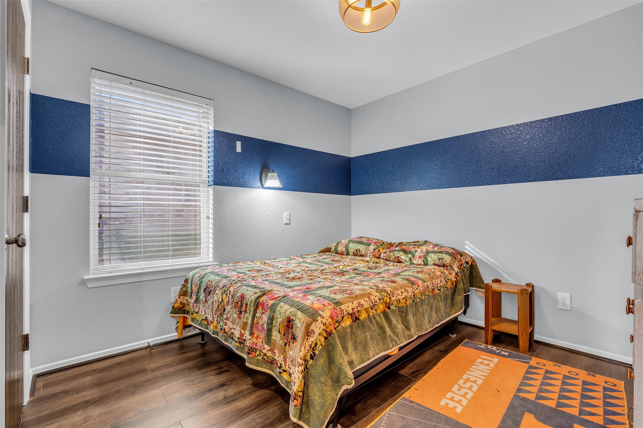 242 Sunset Path North Conroe, TX 77316 - Photo 29 of 37 Bedroom 2 features easy-care vinyl plank flooring. 242 SUNSET PATH N - Request your tour today!