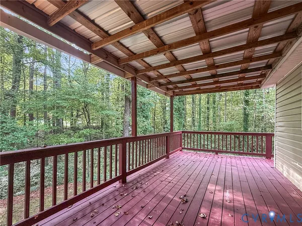 a view of porch with wooden floor in stairs