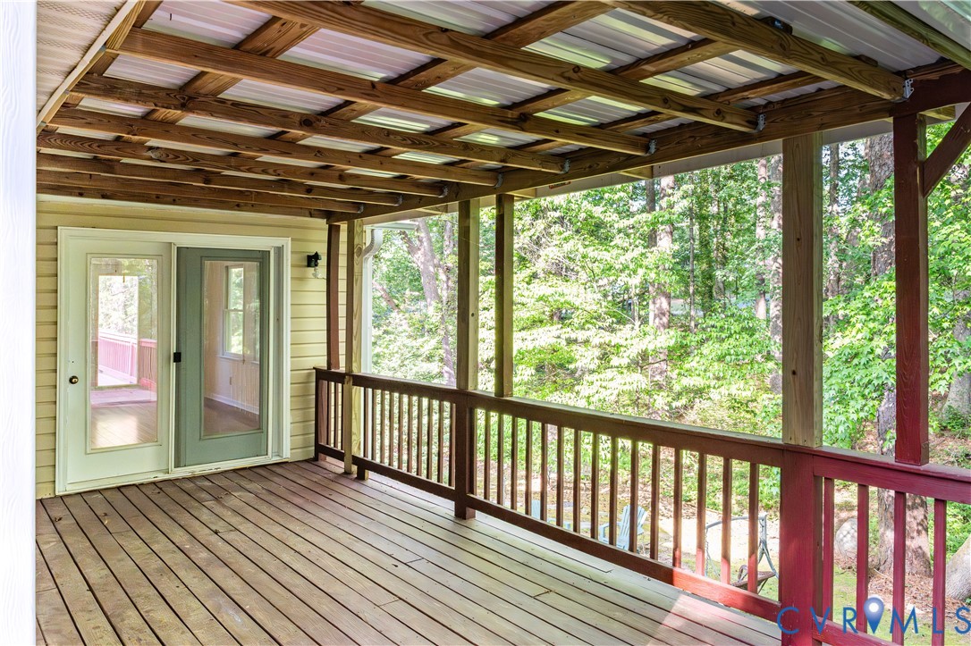 1024 Green Hill Road South Hill, VA 23970 - Photo 25 of 30 a view of a porch with wooden floor and outdoor space