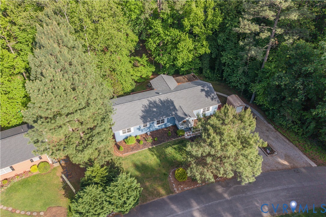 1024 Green Hill Road South Hill, VA 23970 - Photo 27 of 30 an aerial view of a house with a yard and trees