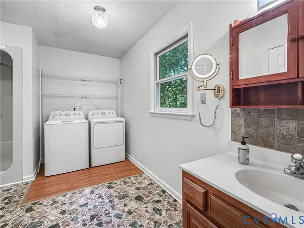 a utility room with dryer and washer