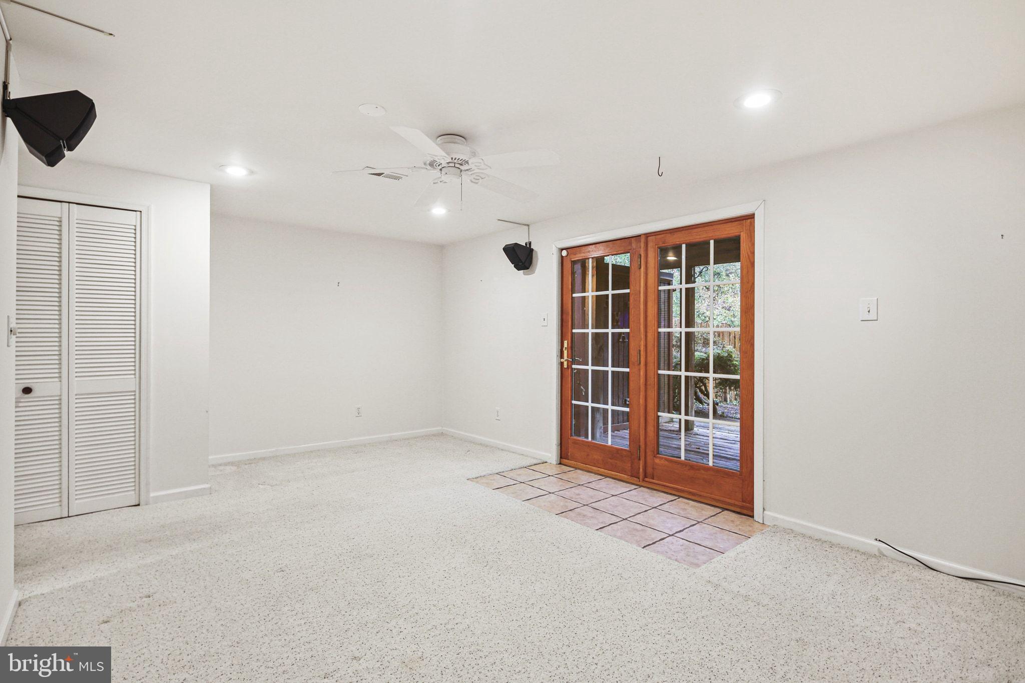 6322 Wimbledon Court Elkridge, MD 21075 - Photo 22 of 27 an empty room with a empty space and windows