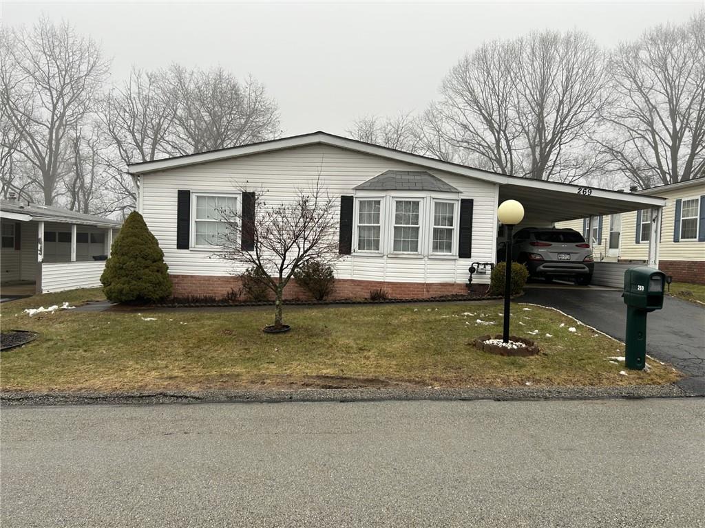 269 Ridge Lane Murrysville, PA 15668 - Photo 1 of 32 a front view of a house with a yard