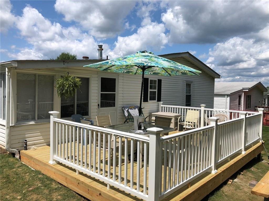 269 Ridge Lane Murrysville, PA 15668 - Photo 32 of 32 a view of a house with large windows and wooden fence