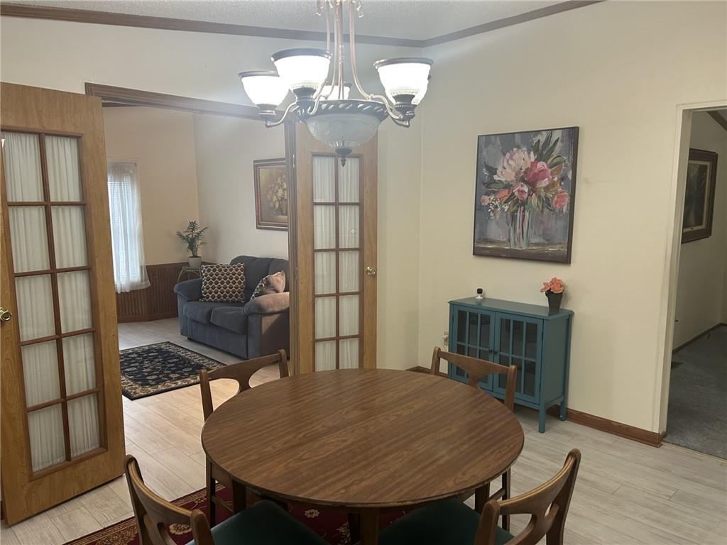 269 Ridge Lane Murrysville, PA 15668 - Photo 6 of 32 a dining room with furniture and wooden floor