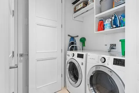 a view of washer and dryer in a utility room