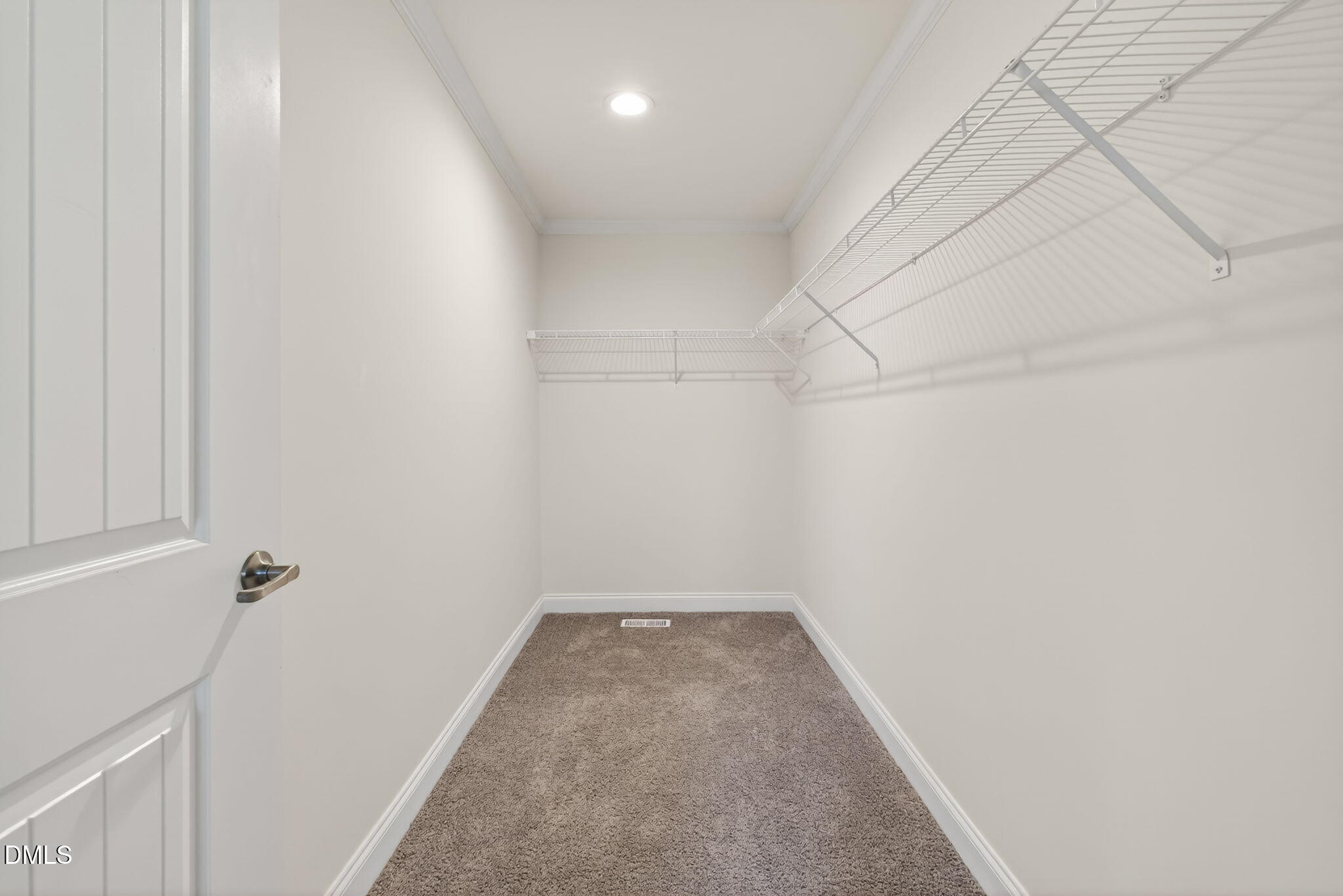 7122 Guess Road Hillsborough, NC 27278 - Photo 22 of 48 a view of a room with rack on the wall