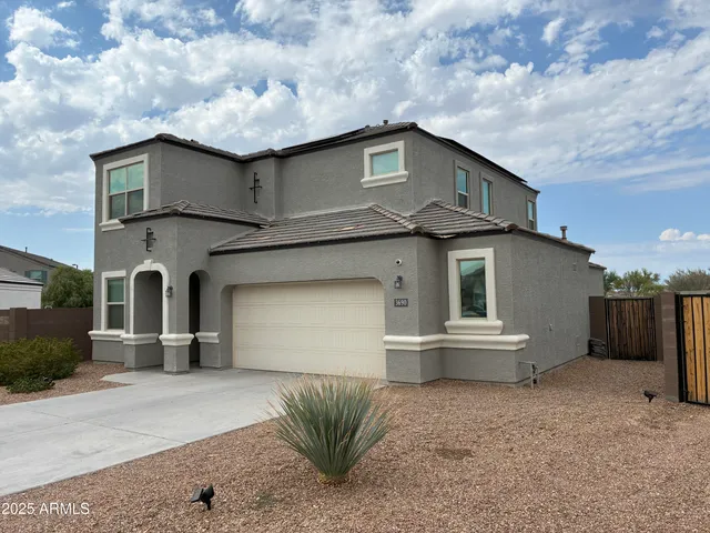 a house view with a garden space
