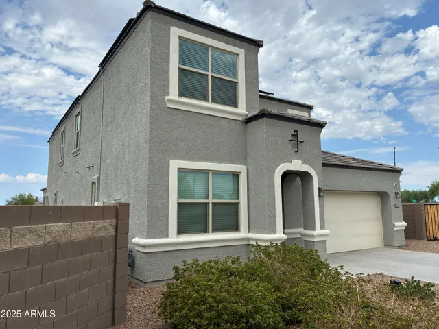 a front view of a house with windows