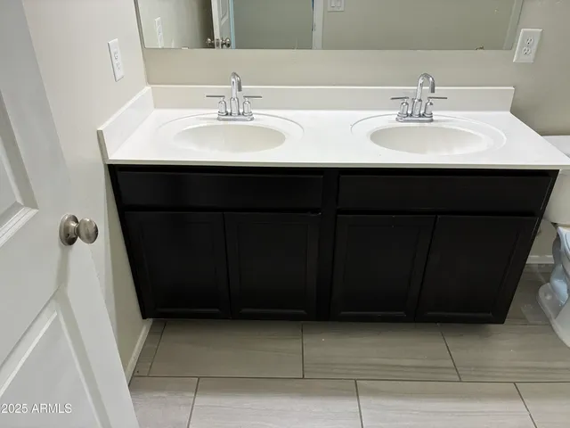 a sink with a mirror