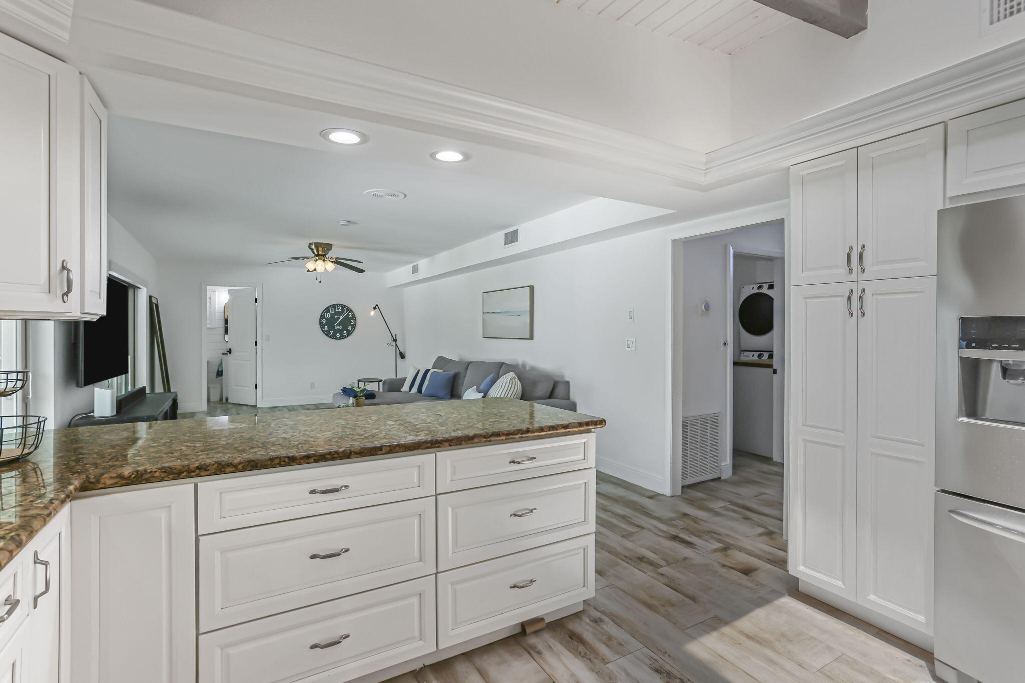 1260 Northwest 15th Street Boca Raton, FL 33486 - Photo 17 of 52 a bathroom with a granite countertop sink a mirror and shower