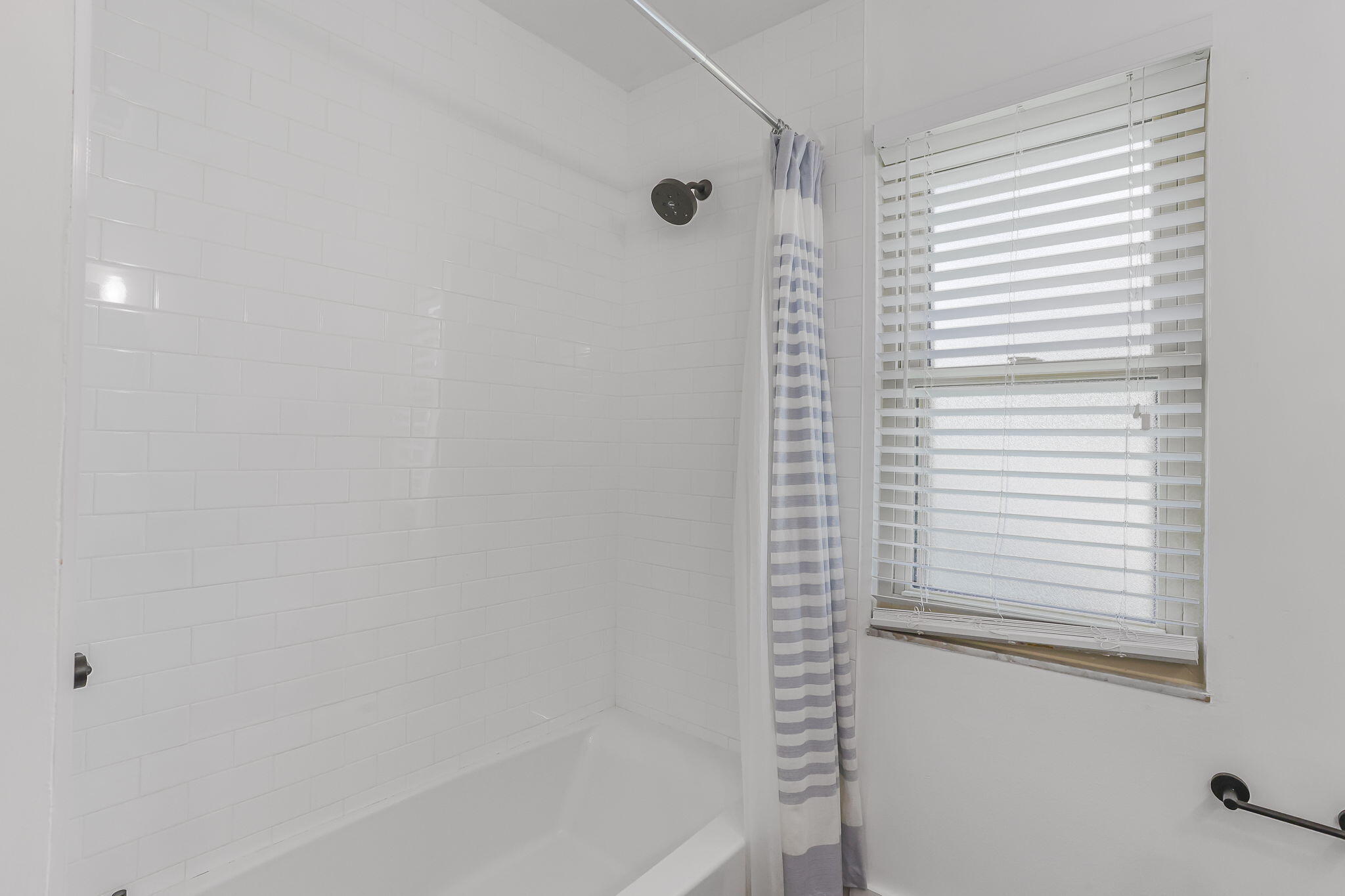 1260 Northwest 15th Street Boca Raton, FL 33486 - Photo 24 of 52 a bathroom with a bathtub and a shower