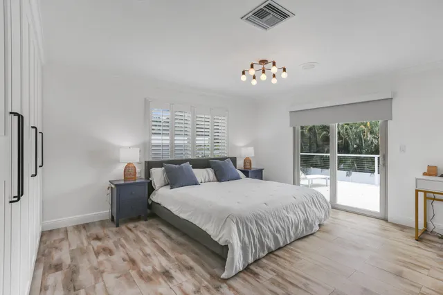 a view of a swimming pool with a porch