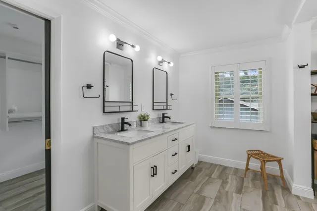 an aerial view of a house with a garden