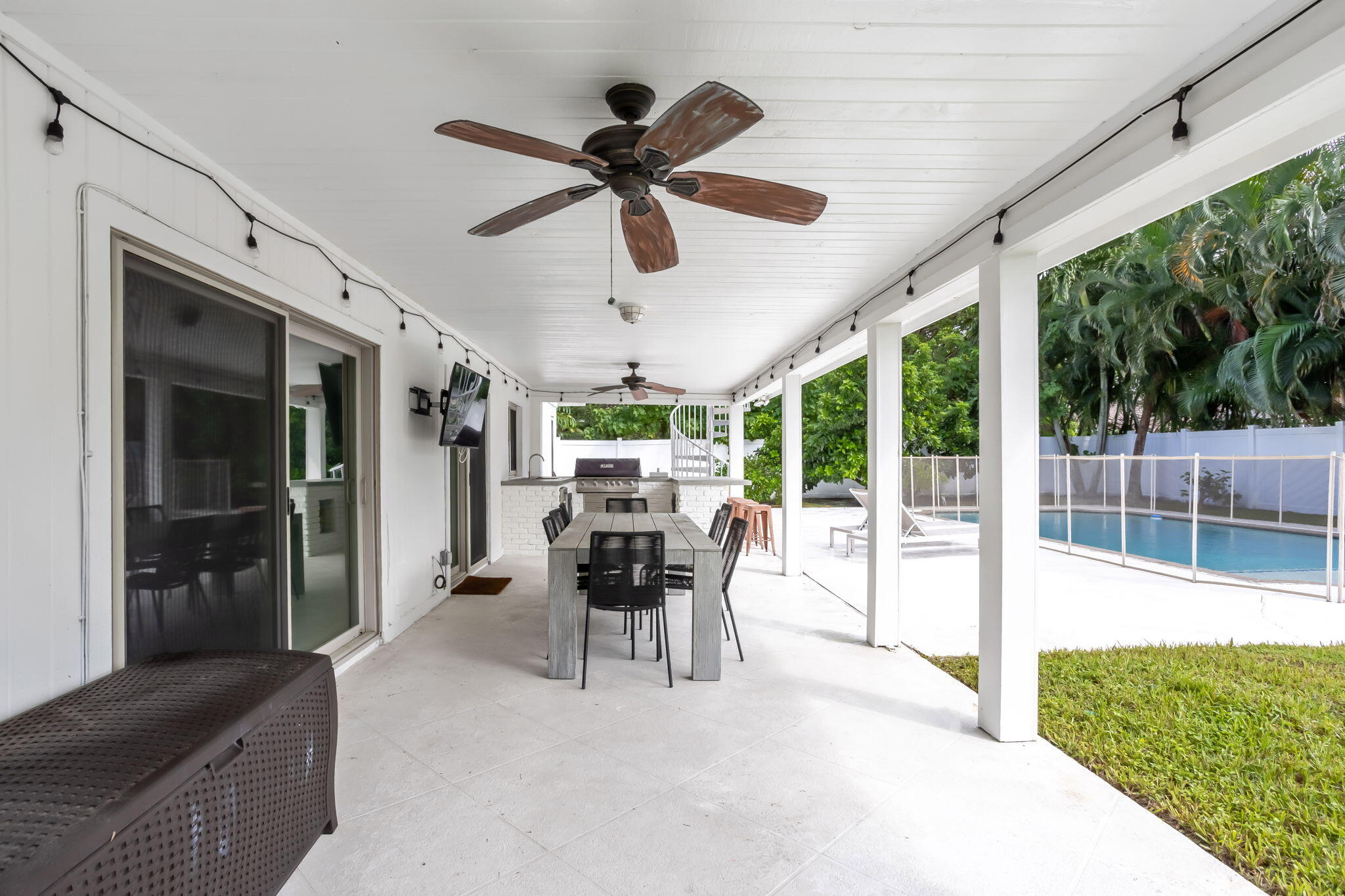 1260 Northwest 15th Street Boca Raton, FL 33486 - Photo 36 of 52 a dining room with furniture and a large window