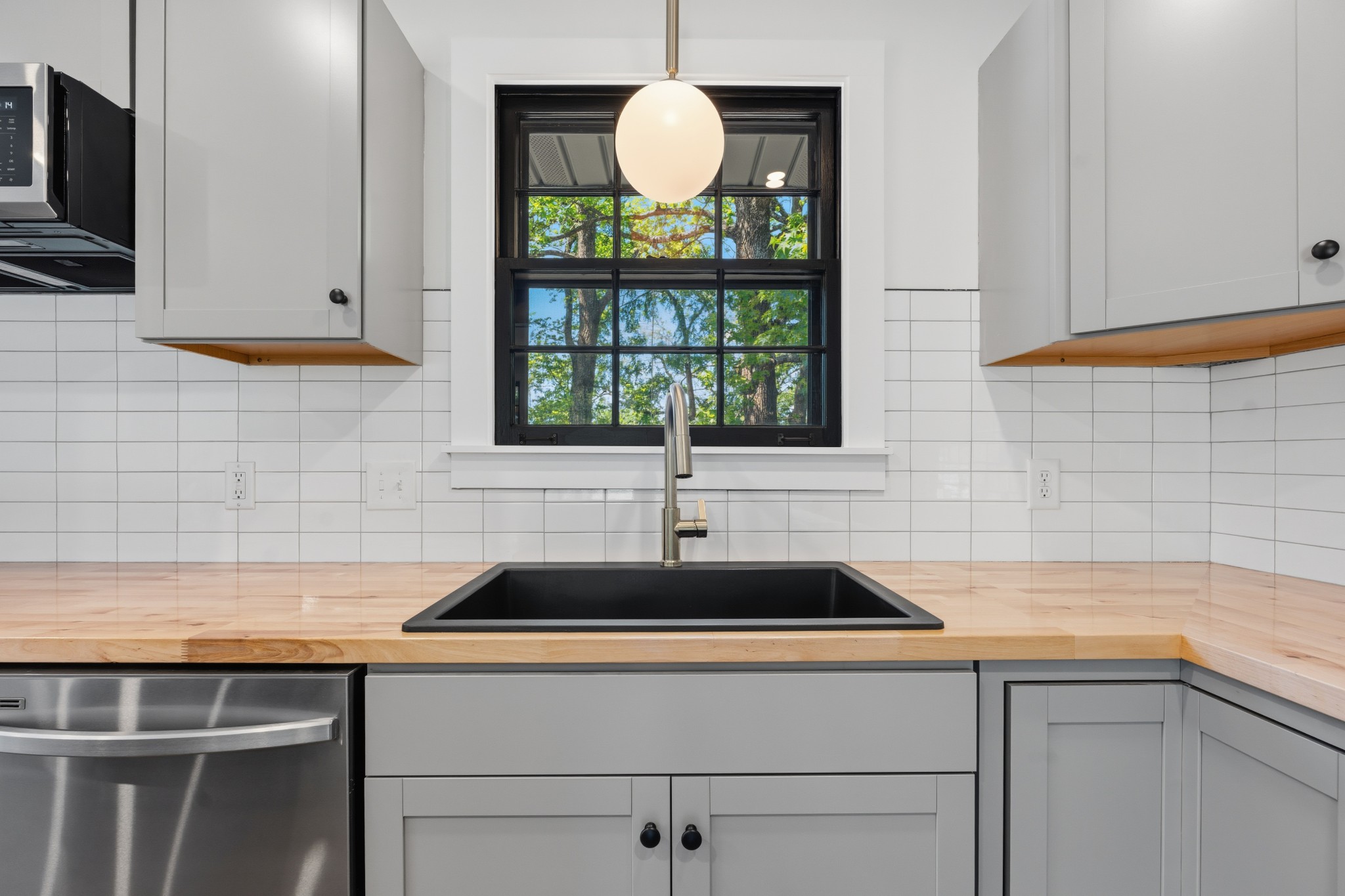 616 Baton Rouge Court Hermitage, TN 37076 - Photo 15 of 43 a kitchen with a sink and a window