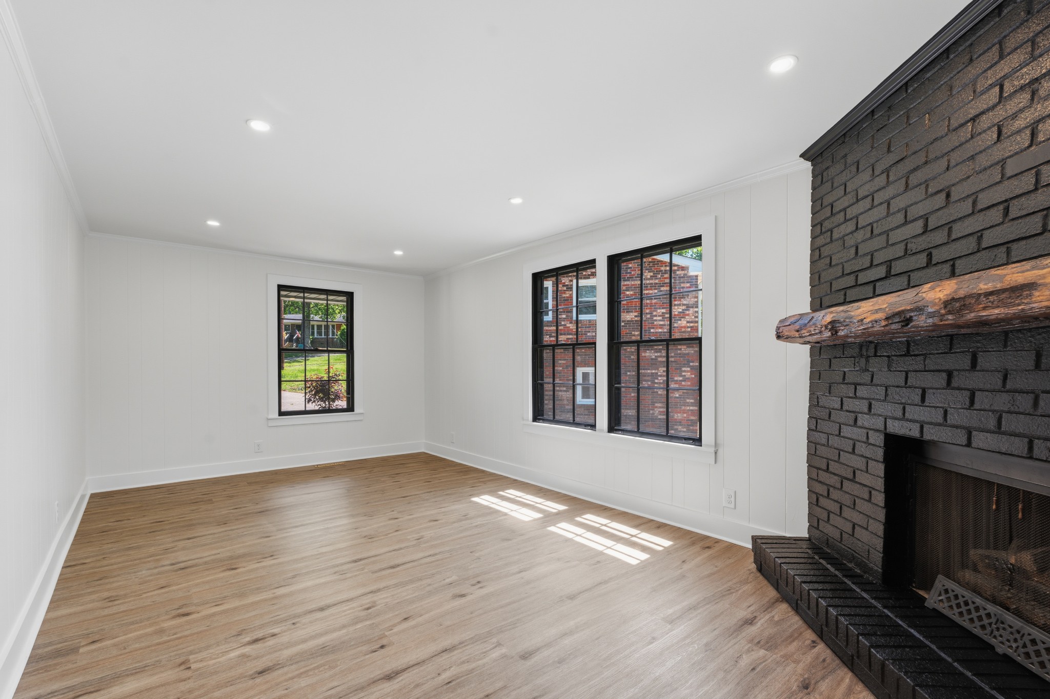 616 Baton Rouge Court Hermitage, TN 37076 - Photo 20 of 43 a view of an empty room with a fireplace and a window