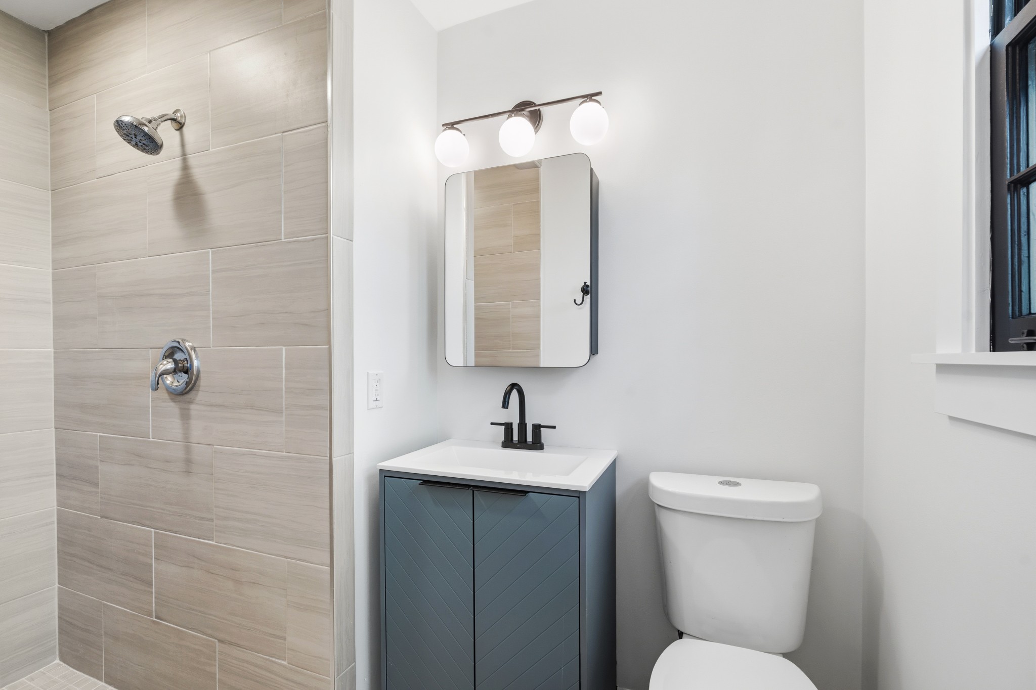 616 Baton Rouge Court Hermitage, TN 37076 - Photo 26 of 43 a bathroom with a toilet sink and mirror