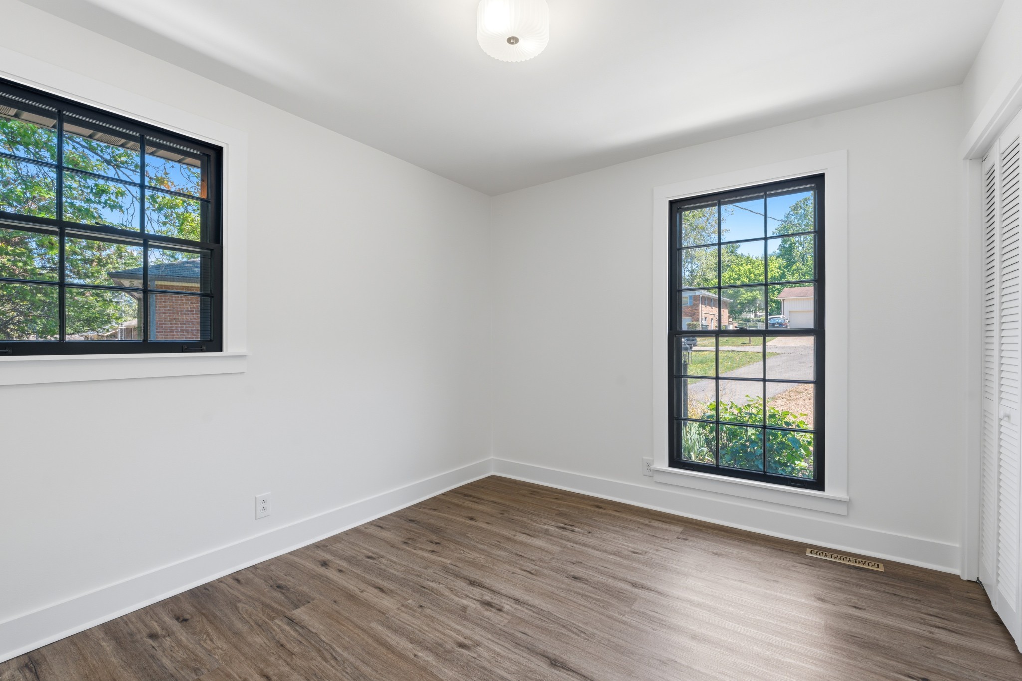 616 Baton Rouge Court Hermitage, TN 37076 - Photo 32 of 43 a view of empty room with wooden floor and fan
