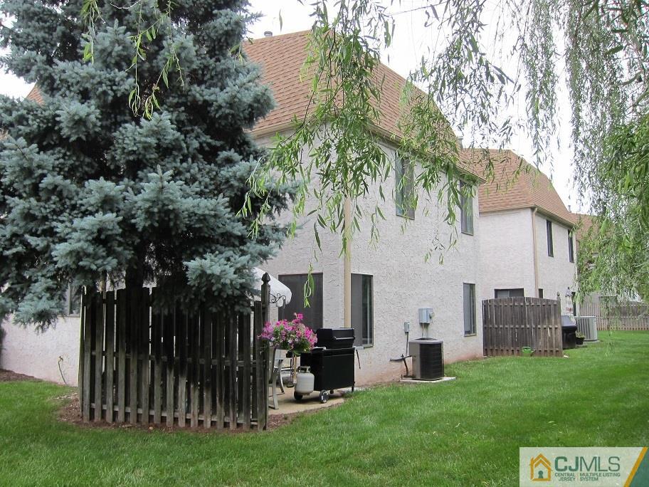 49 Park Gate Drive Edison, NJ 08820 - Photo 16 of 17 a view of a house with a backyard
