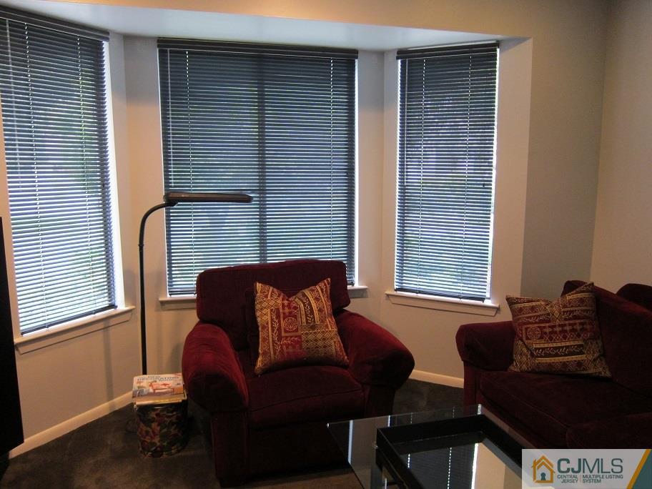 49 Park Gate Drive Edison, NJ 08820 - Photo 9 of 17 a outdoor living room with furniture and a window