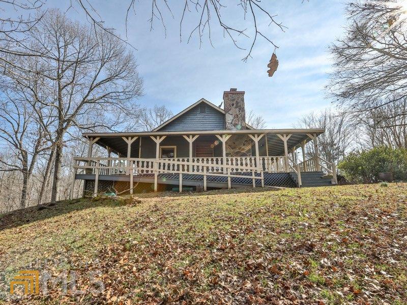 1848 Camp Branch Road, Unit TR 5 Ellijay, GA 30540 - Photo 1 of 1 a house with trees in front of it