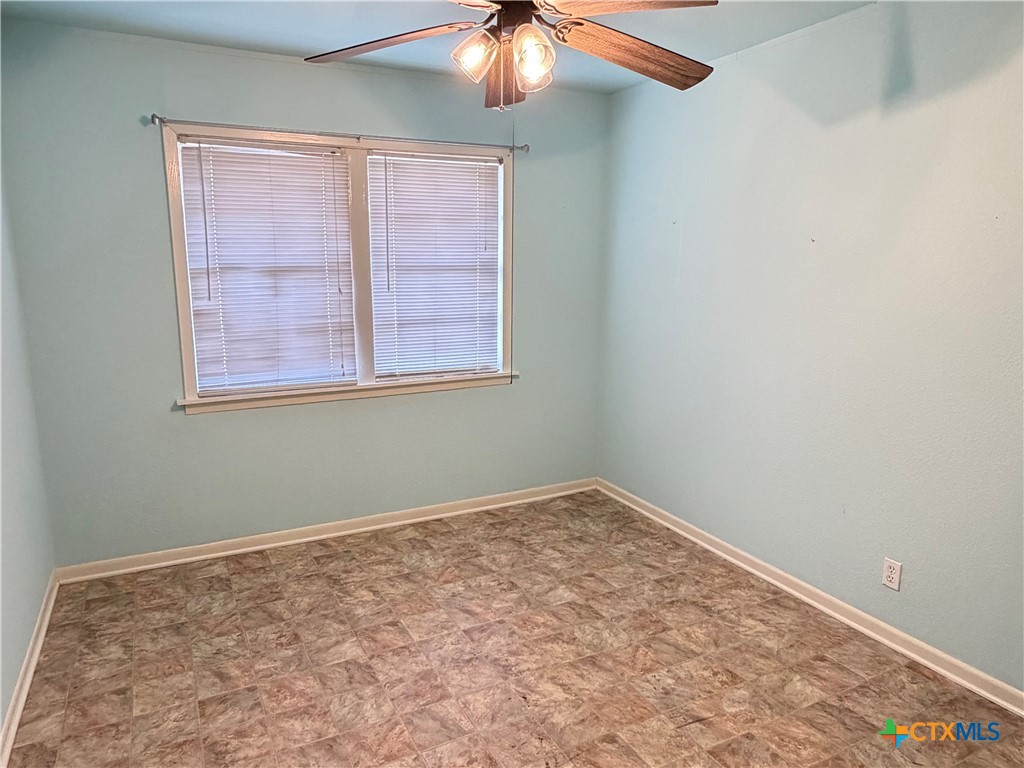 1902 Navidad Street Victoria, TX 77901 - Photo 15 of 23 an empty room with a window