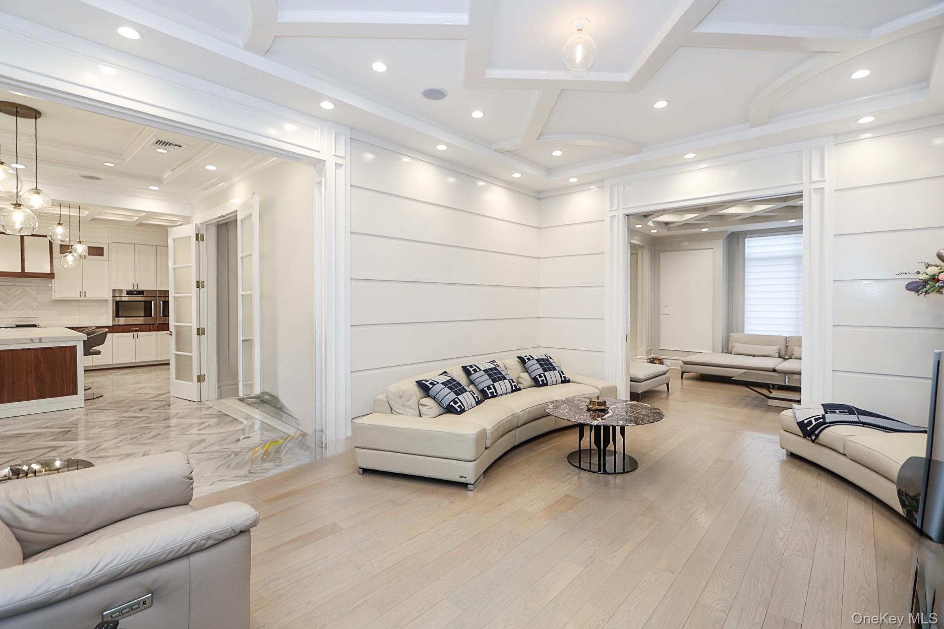 19 Gilbert Road Great Neck, NY 11024 - Photo 17 of 36 a living room with furniture gym equipment and view of living room