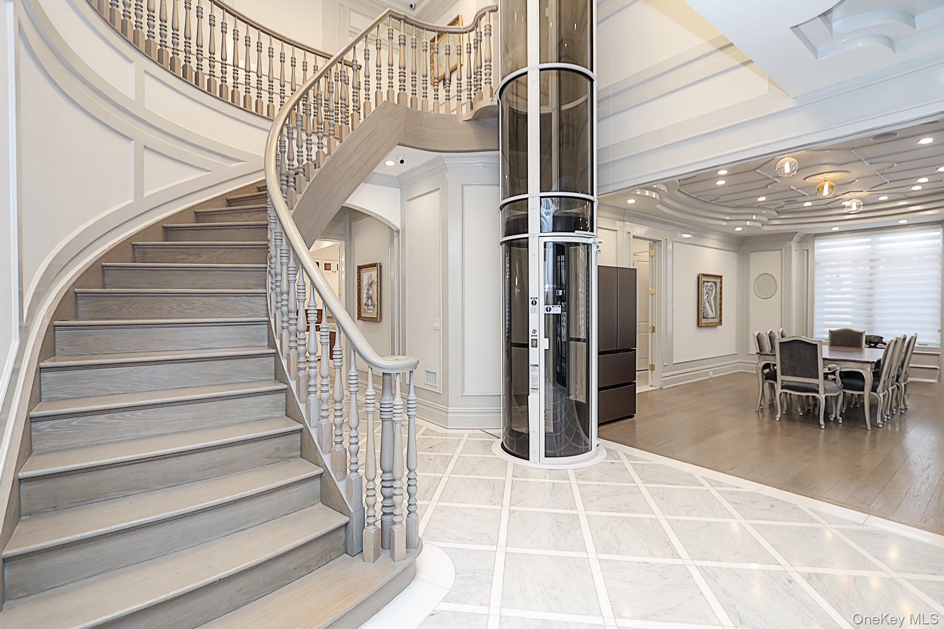 19 Gilbert Road Great Neck, NY 11024 - Photo 5 of 36 a view of entryway and hall with dining room
