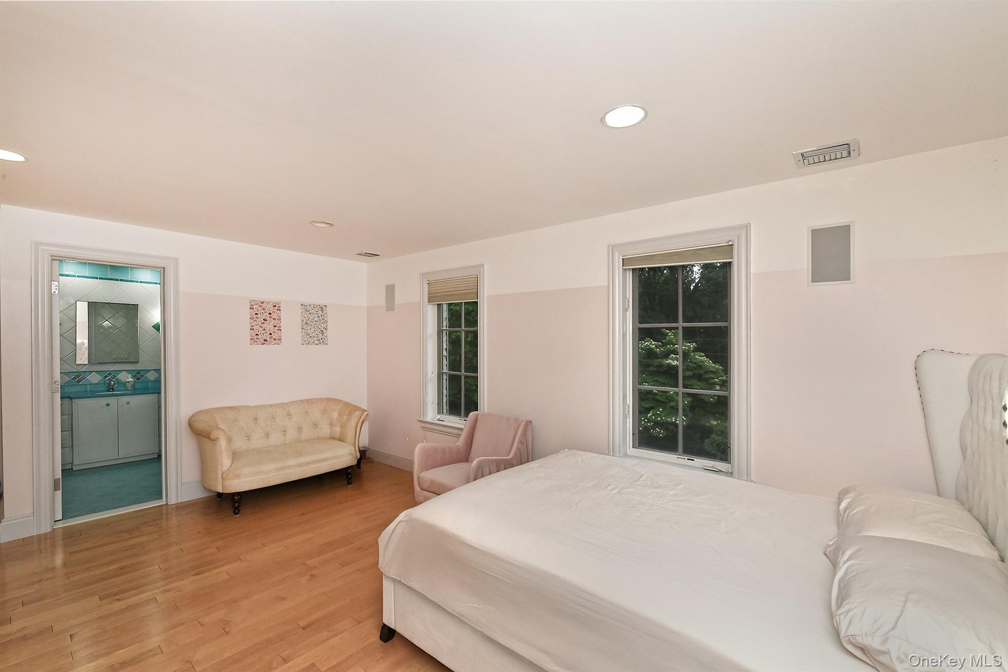 14 Norgate Road Glen Head, NY 11545 - Photo 29 of 44 a bedroom with a bed and a window