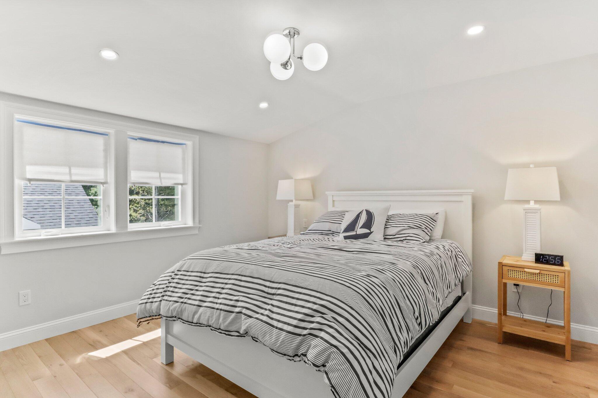 58 Cobblestone Circle Mashpee, MA 02649 - Photo 21 of 49 a bedroom with a bed and a window