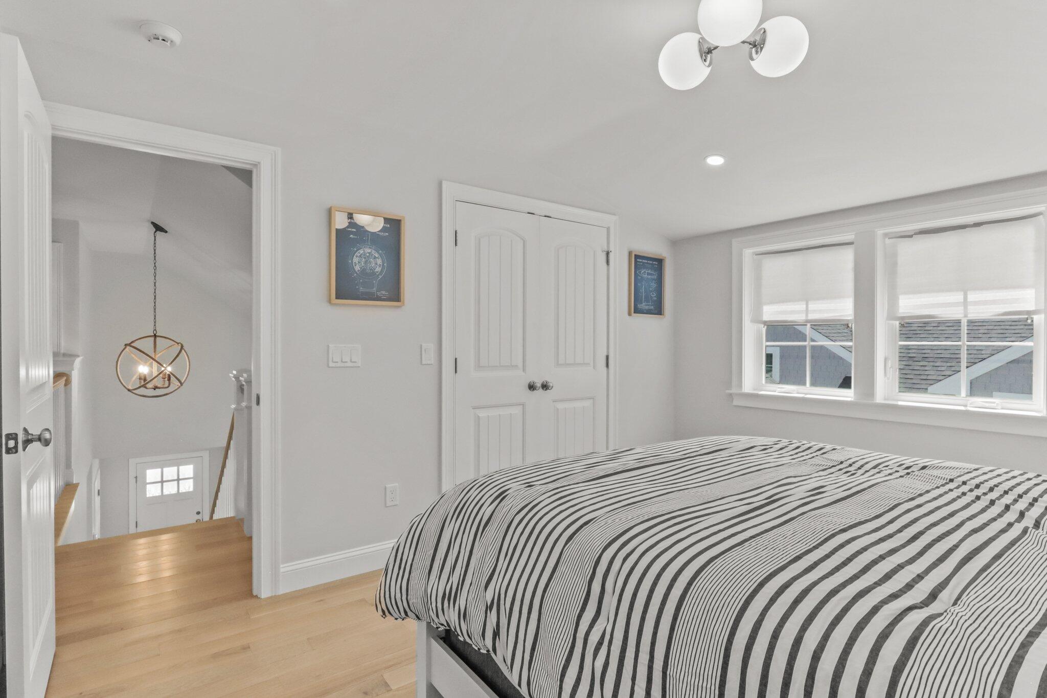 58 Cobblestone Circle Mashpee, MA 02649 - Photo 22 of 49 a bedroom with a bed and a window