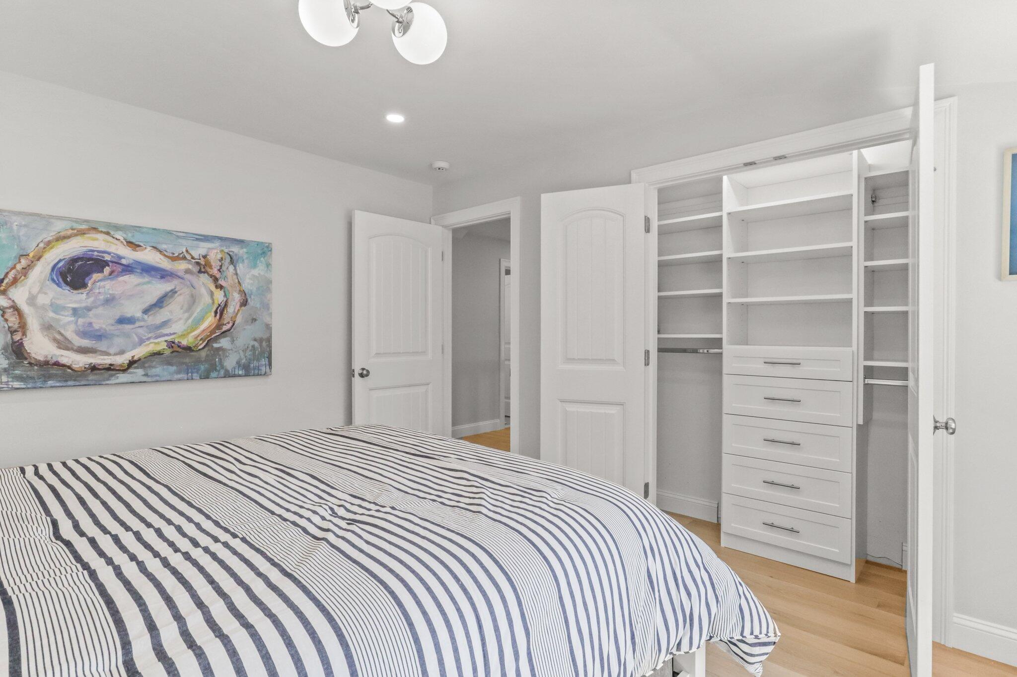 58 Cobblestone Circle Mashpee, MA 02649 - Photo 23 of 49 a bedroom with a bed and closet