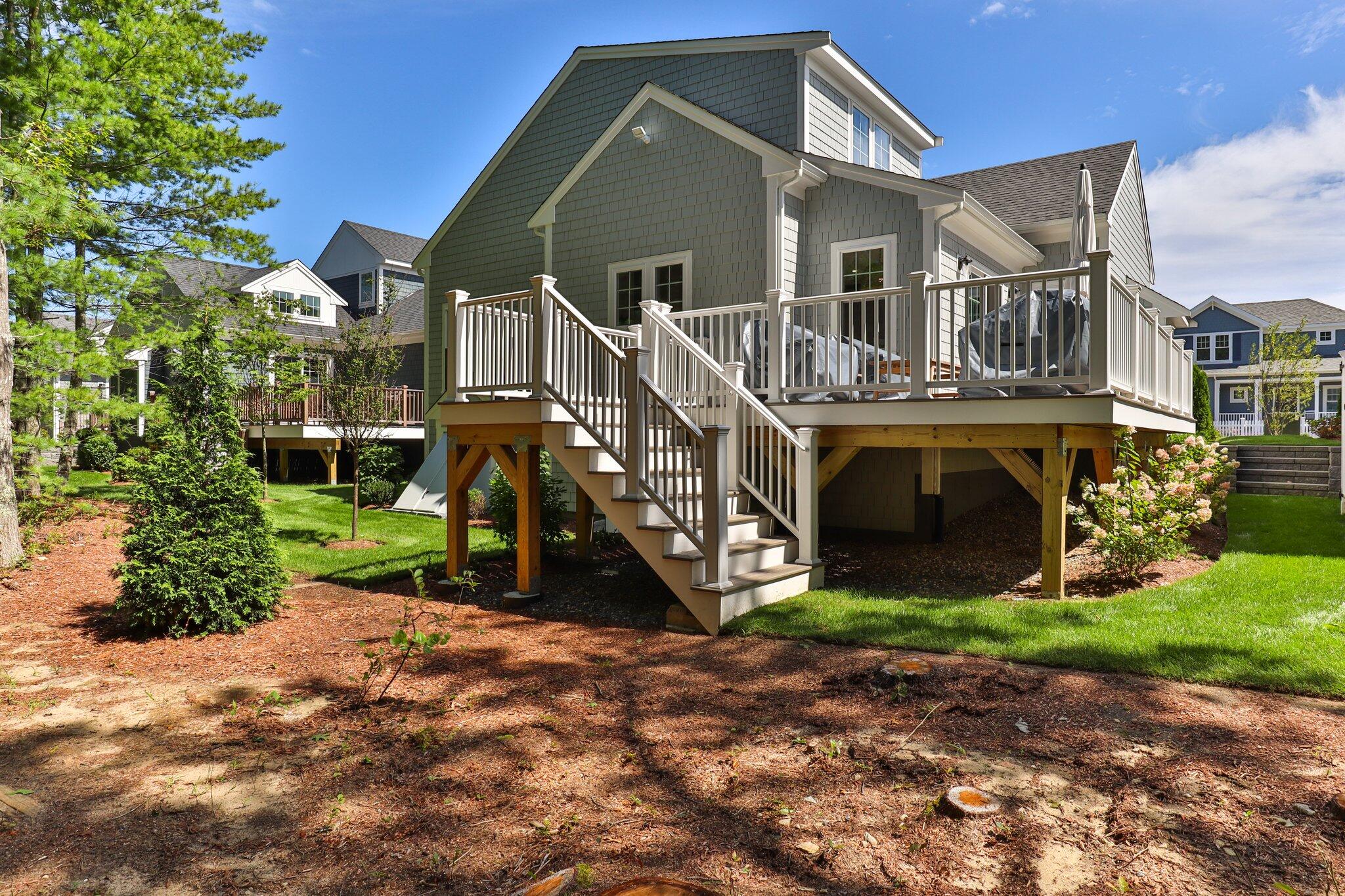 58 Cobblestone Circle Mashpee, MA 02649 - Photo 29 of 49 a view of a house with a yard