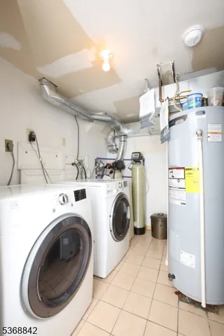 a view of a livingroom with furniture and a flat screen tv