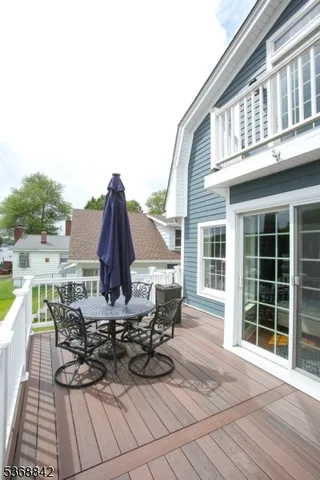 a view of a sitting area with lake view