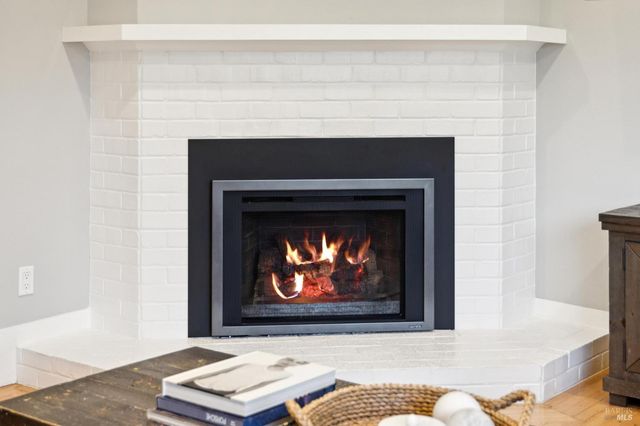 a living room with a fireplace