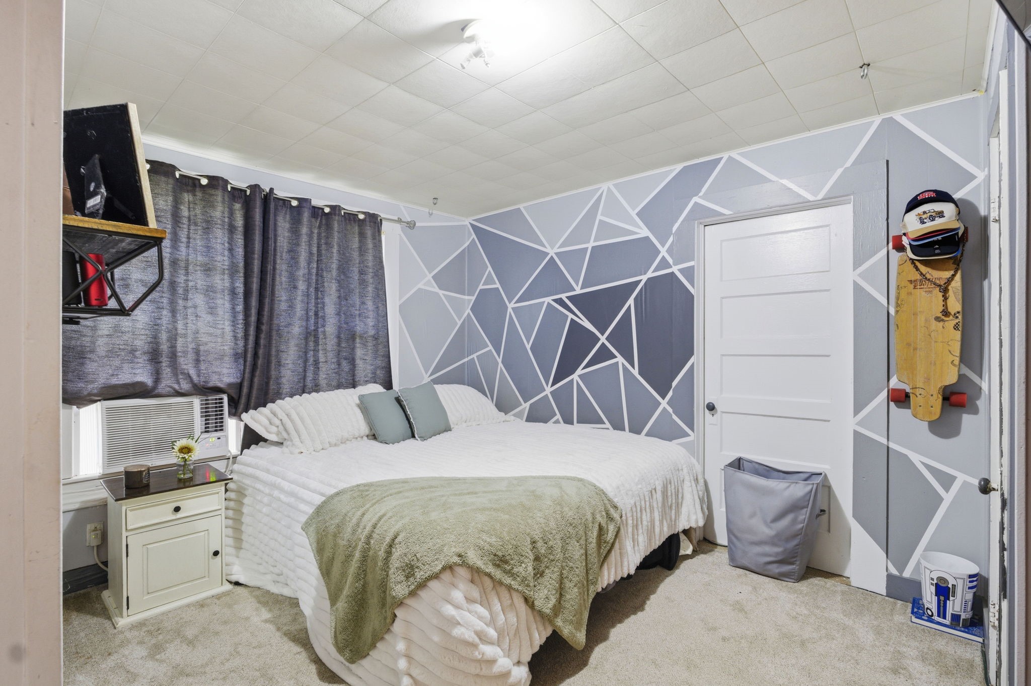 6902 Concord Road Beaumont, TX 77708 - Photo 15 of 18 a bedroom with a bed and a walk in closet