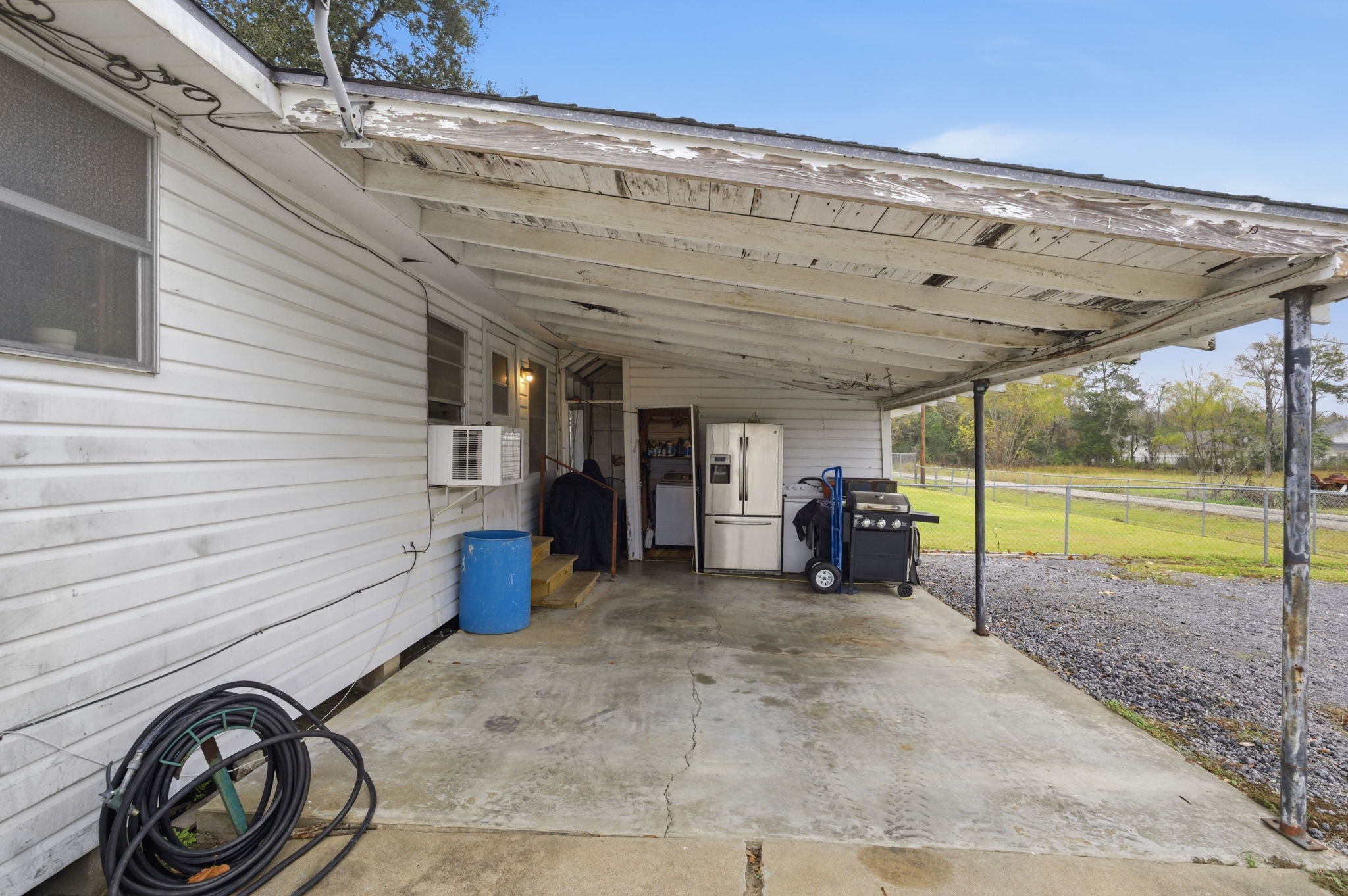 6902 Concord Road Beaumont, TX 77708 - Photo 16 of 18 a view of a bike storage and utility room