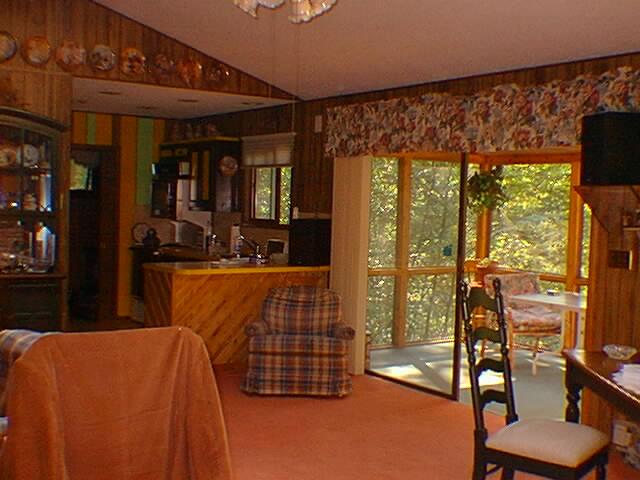 740 Decker Road Bushkill, PA 18324 - Photo 1 of 3 a living room with a large window
