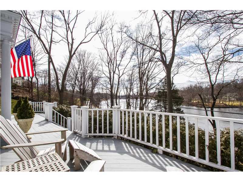 106 Goodwives River Road Darien, CT 06820 - Photo 1 of 24 a view of a bench in a patio